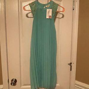 Entro sleeveless aquamarine boutique dress.